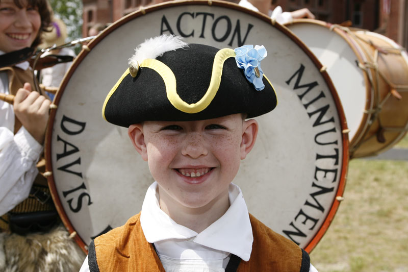 Seven-year-old Carter St. Lawrence of Acton played the bass drum with the Acton Minutemen Davis Blues Band. (Photo by Ellen Harasimowicz)
