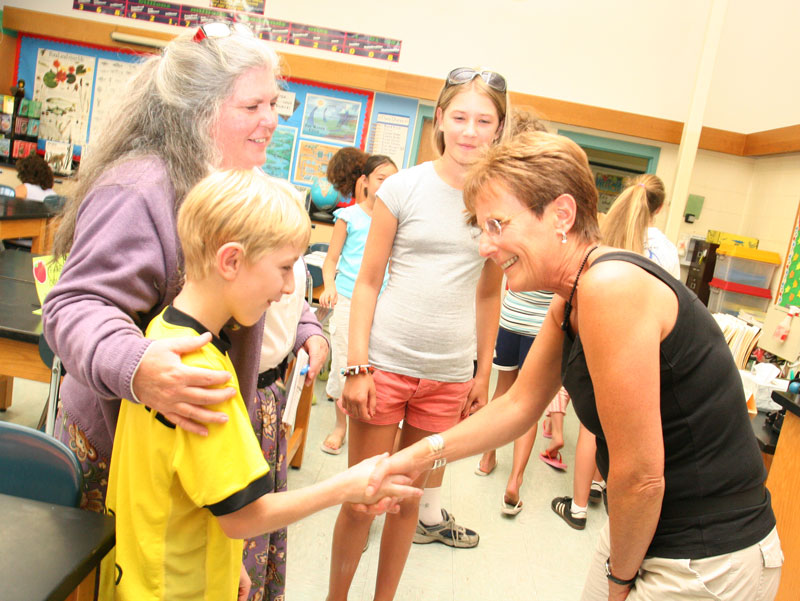 At the open house at the elementary school, Abbie and Charlie Frost meet Charlie’s fifth-grade teacher Mrs. Monet as Emma Noyes looks on.