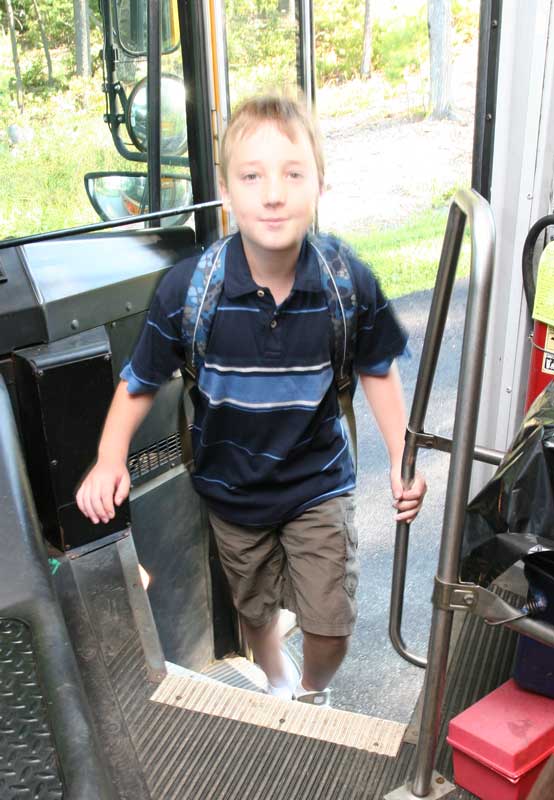 Nicholas Endicott boards bus 6 on the first day of school.