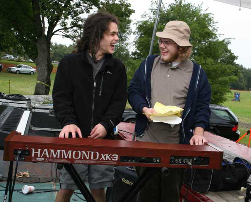 Saul Alpert-Abrams and Justin Baker of Sometimes Charlie warm up before their performance.