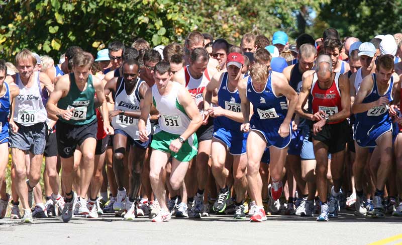 Runners spring into action at the start in front of Fruitlands. Some roads were temporarily closed so the runners could pass safely.