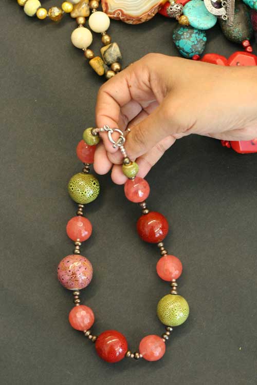 One of Sharon Chandler’s unique beaded necklaces made of clay, pearl, and quartz. (Photo by Lisa Aciukewicz) 