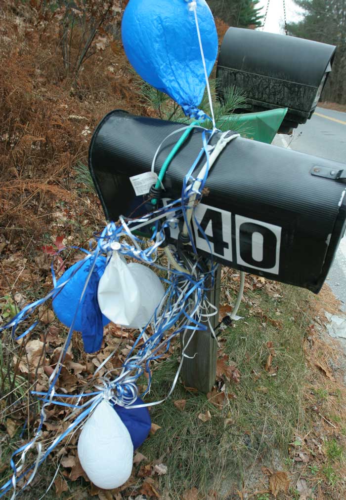 Ugly mailbox or lucky charm? This one has welcomed home many champion teams.