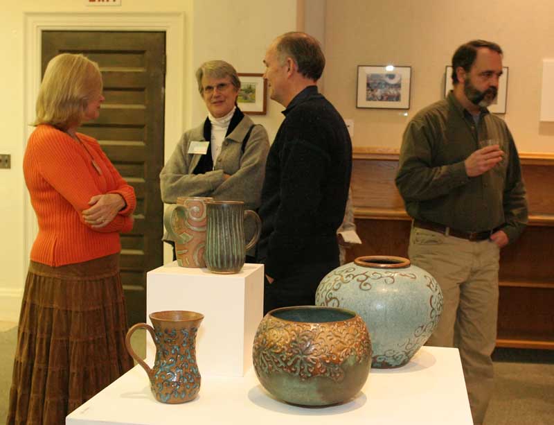 Left to right: Carol Panek-Clark, Judy Warner, Jim Clark, and Tom Keaney chat during the artists’ reception. (Photo by Lisa Aciukewicz) Left to right: Carol Panek-Clark, Judy Warner, Jim Clark, and Tom Keaney chat during the artists’ reception. (Photo by Lisa Aciukewicz)