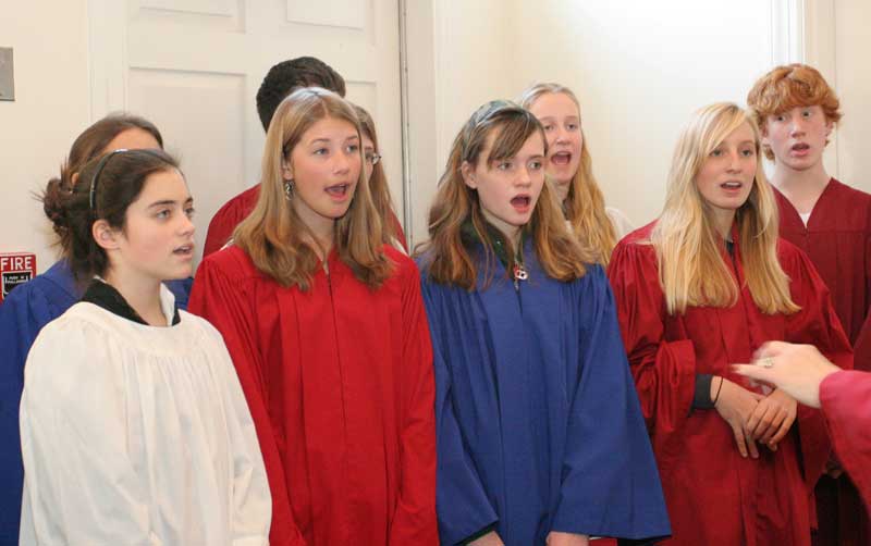 Choir singers Mackenzie Grant, Emma Noyes, Kaley Papat, Liz Frothingham, Henley Siegrist, and Hunter Siegrist.