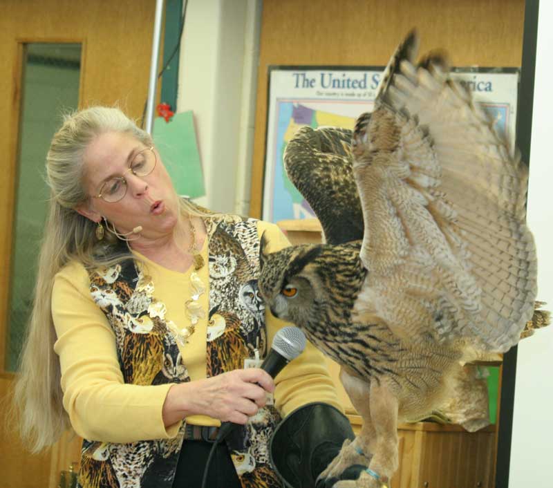 Marcia Wilson hoots to her Eurasian eagle owl.