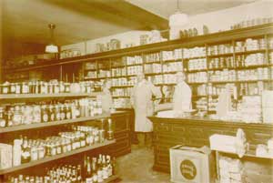 At the old Kerley, Reed & Bryant General Store: Edna Robinson, left, Bill Kerley, and Reuben A. Reed. (Photo courtesy of Harvard Historical Society)