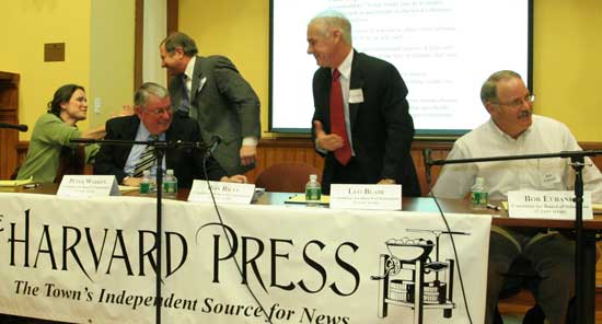 Left to right: Candidates Marie Sobalvarro, Peter Warren, Ron Ricci, Leo Blair, and Bob Eubank relax after the Board of Selectmen debate held March 17 at Volunteers Hall.