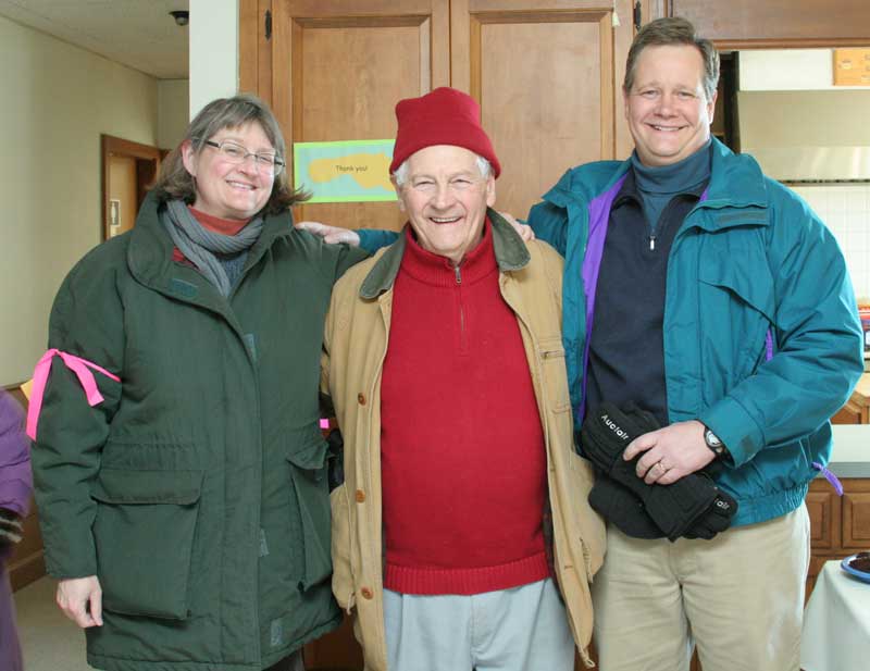 Ken Van Wormer (center)  poses with his daughter Mary McGrath and son Phil Van Wormer.  Ken’s late wife Charlanne served for 17 years as coordinator, director, fundraiser, worker, and walker to raise money for local food pantries.