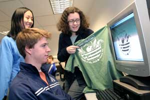 Kaitlin Wang, Zack Clements, and Kate Oglesby review the design that was chosen for this year’s Fourth of July T-shirt contest. (Photo by Lisa Aciukewicz) Kaitlin Wang, Zack Clements, and Kate Oglesby review the design that was chosen for this year’s Fourth of July T-shirt contest. (Photo by Lisa Aciukewicz)