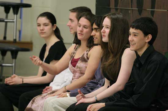 Students listen to a lesson in etiquette. Left to right are Dominique Ledoux, Eryk Lorenz-Kruk, Rita Fagan, Arjuna Hayes, Vivian Ferrillo, and Max Flaton.