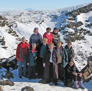 The knitters pose on the harsh snow-covered landscape of Iceland. (Photo by Lynn Cooke) The knitters pose on the harsh snow-covered landscape of Iceland. (Photo by Lynn Cooke)