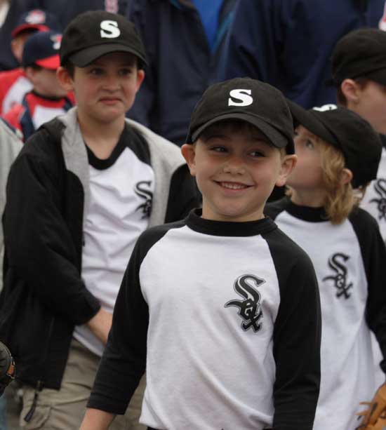 Connor O’Shea, Alex Maggan, and Gabriel Sennott march with the White Sox.