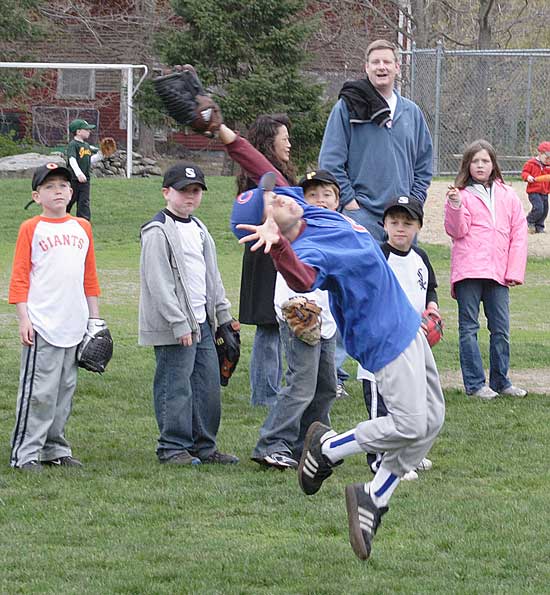 Joey D’Amore makes a valiant effort to catch a high fly.
