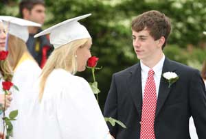 Annie Lierhaus and class marshall Sam Peisch wait for the ceremony to begin.