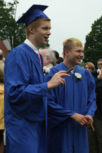 Connor Kempton and Mike Horowitz celebrate with cigars.