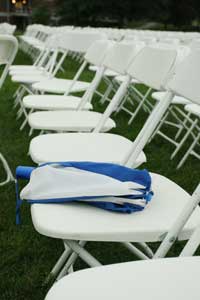 An abandoned umbrella goes unused after a rain-free graduation ceremony. 