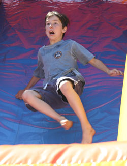 Toss Brown takes his turn on the slide.