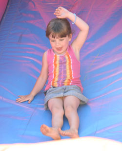 Shea O’Brien takes a ride down the giant slide. 