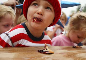 Aidan Long takes a breather and looks up from his pie. (Photo by Lisa Aciukewicz)