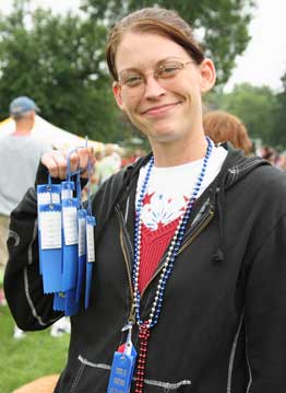Sarah Dickson-Maliszewski of Sheep Island shows off her ribbons after winning the adult pie-eating contest for the 10th straight year! (Photo by Lisa Aciukewicz)