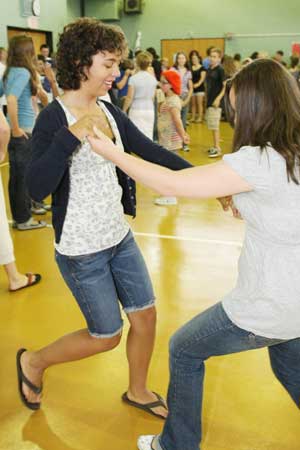 Nellie Agosta learns salsa dancing at Parker Charter School last week.