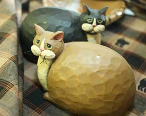 In addition to produce, grocery staples, and lunches, the store offers many gift items such as these wooden cats. (Photo by Lisa Aciukewicz) In addition to produce, grocery staples, and lunches, the store offers many gift items such as these wooden cats. (Photo by Lisa Aciukewicz)
