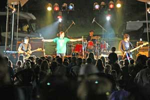 The crowd dances to the music of the Joshua Tree, a U2 tribute band that headlined the Lions Club Fall Festival on Saturday night.