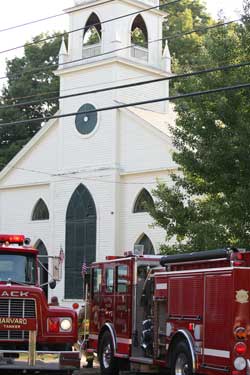 Trucks from 10 towns includng Harvard respond to the scene.