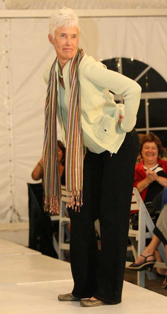Sue Barber shows off the stitching on the back of her Not Your Daughter’s Jeans as well as a twin sweater set by Picadilly.