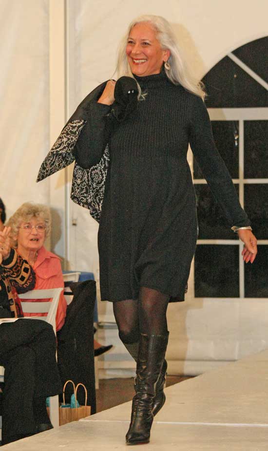Davida Bagatelle wears a black jersey dress by Tribal.