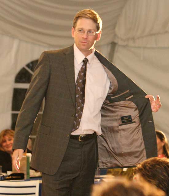 Selectman Tim Clark shows off an HSM charcoal brown suit, inside and out.