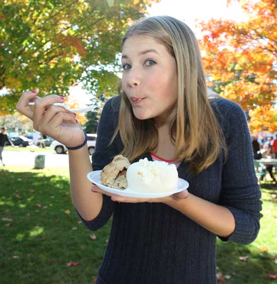 Emma Noyes digs into her apple pie with ice cream. 