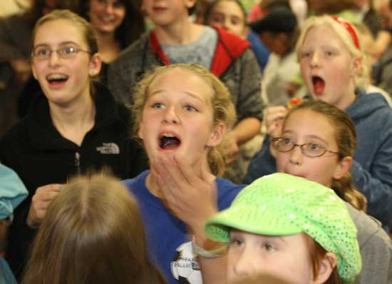 Who will win the $50 gift certificate? (Left to right) Ali Hanlon, Aliza Makey, Lauren Beale, Emma Jackson, and Jenny Woodsum watch in anticipation.
