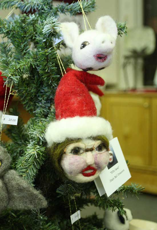 Sarah Palin, John McCain, and Barack Obama were among the political figures made into ornaments by Laura Burke of Bolton for the Historical Society’s holiday arts festival and sale at the old library.