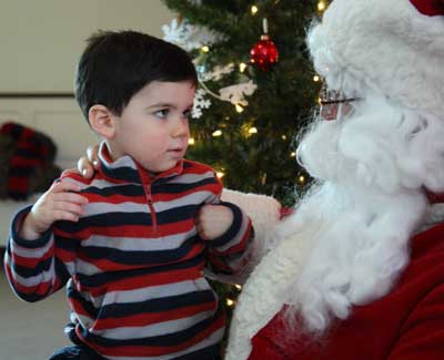 Connor Knoettner has a serious talk with Santa about what he wants for Christmas.