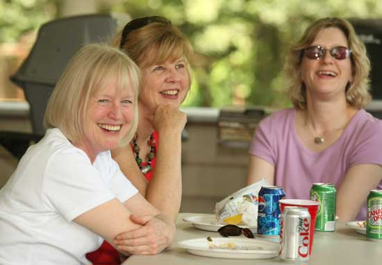 Librarians Mary Wilson, Judy Veno, and Abbey Kingsbury enjoy a barbecue lunch for town employees in August.