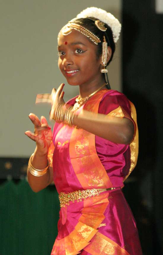 Fifth-grader Anjani Hodgkins performs a classical Indian dance at the Festival of Cultures held at the elementary school in March.
