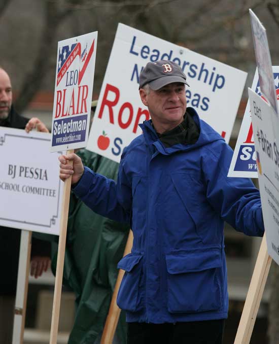 Leo Blair stands in front of the Bromfield polls during a successful run for selectman.