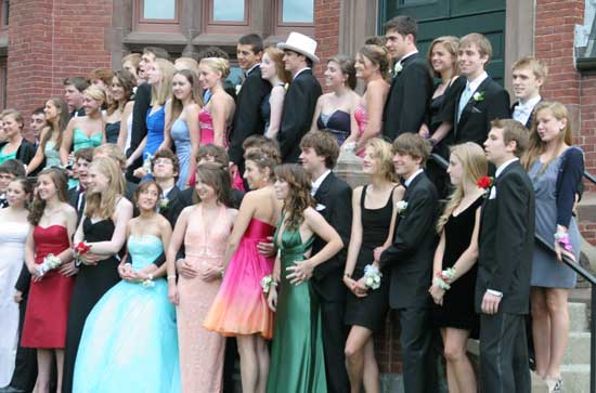 Bromfield students pose in front of Old Bromfield on prom night.