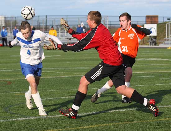 Sam Peisch heads the ball past Maynard’s goalkeeper in a district final win. Bromfield would later go on to take the state title in a win against Hamilton-Wenham.