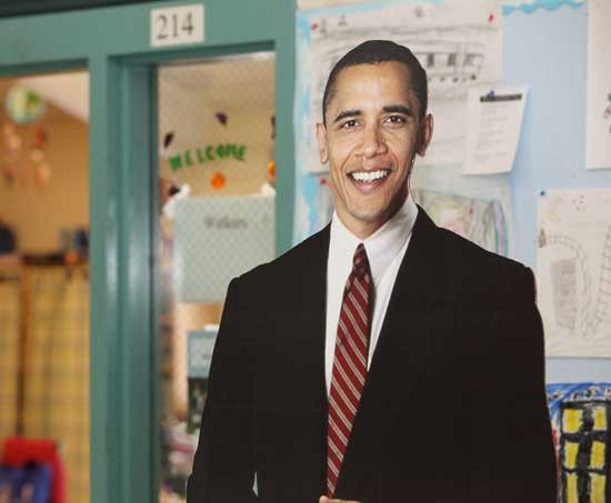 A life-sized cut out of Barack Obama stands in the hallway of the elementary school to greet students on inauguration day.