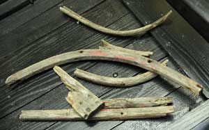 The wood remaining from the original sleigh rests atop the new sleigh. (Photo by Lisa Aciukewicz)