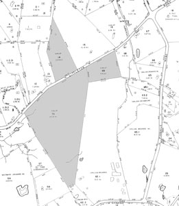 Dunlap land protected by the conservation restriction is shaded in gray in this copy of the town assessors’ map. The plots straddle Old Littleton Road and abut Carlson’s orchards.