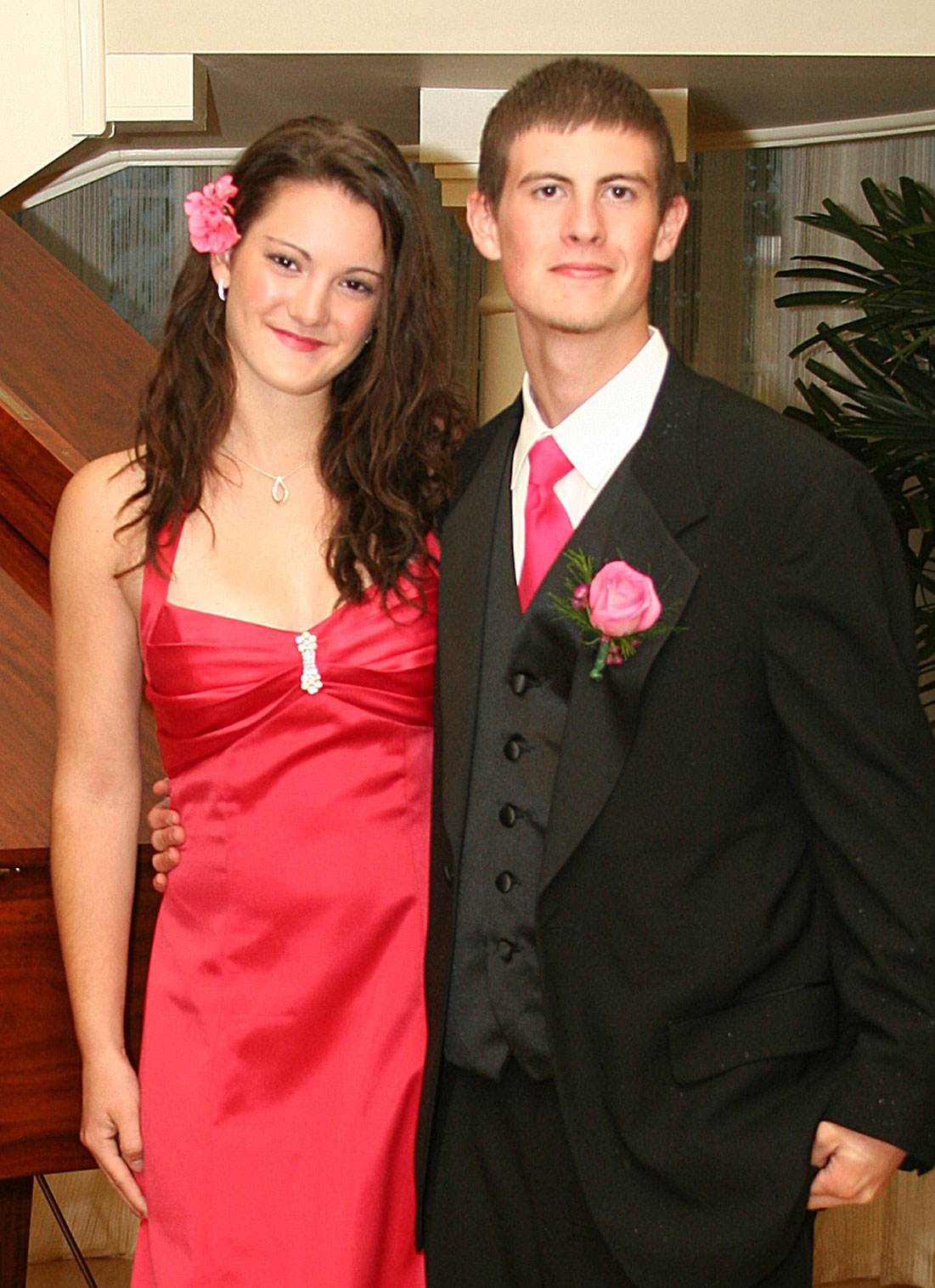 Courtney Kenyon and Rob Williams pose for a formal portrait. 