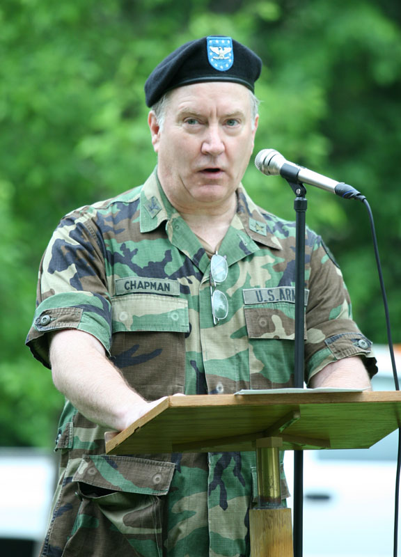 Guest speaker Colonel Duncan Chapman III urges the crowd to remember and honor the great sacrifice of soldiers injured in Iraq and ready to be redeployed.