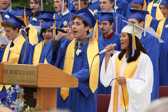 Paul Jordan Talbot and Elizabeth Krutz lead the Class of 2009 in the class song, Marvin Gaye's "Ain't No Mountain High Enough," during Bromfield's graduation ceremony.